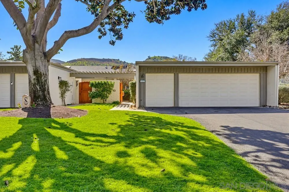 16057 El Tae Road, Unit 31 Pauma Valley, CA 92061 - Photo 3 of 25 a front view of a house with garden