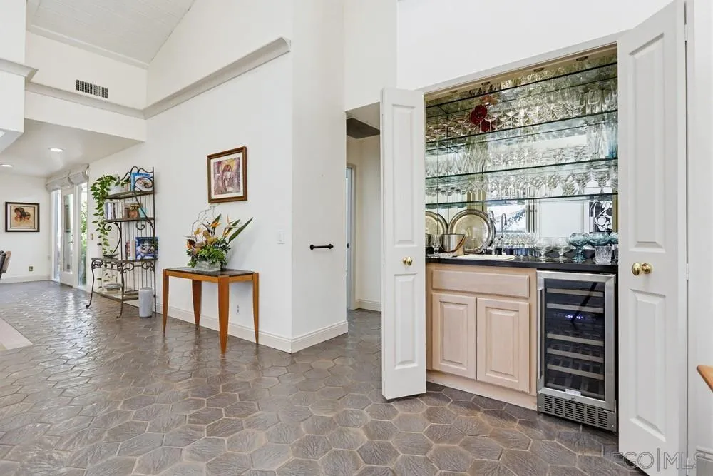 16057 El Tae Road, Unit 31 Pauma Valley, CA 92061 - Photo 7 of 25 a kitchen with stainless steel appliances a stove and a refrigerator