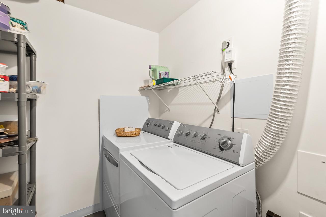 8450 Stonewall Road Manassas, VA 20110 - Photo 36 of 48 a utility room with dryer and washer