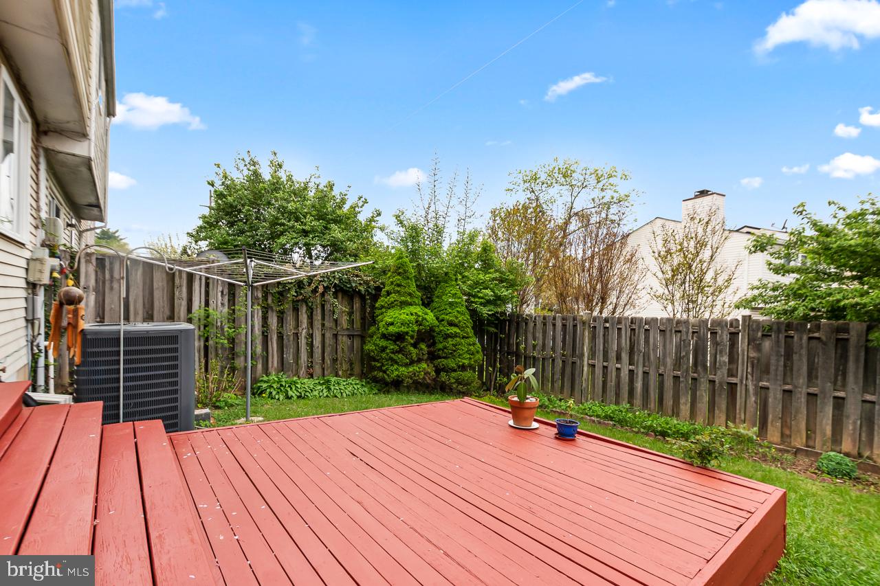 8450 Stonewall Road Manassas, VA 20110 - Photo 37 of 48 a view of a backyard with wooden fence