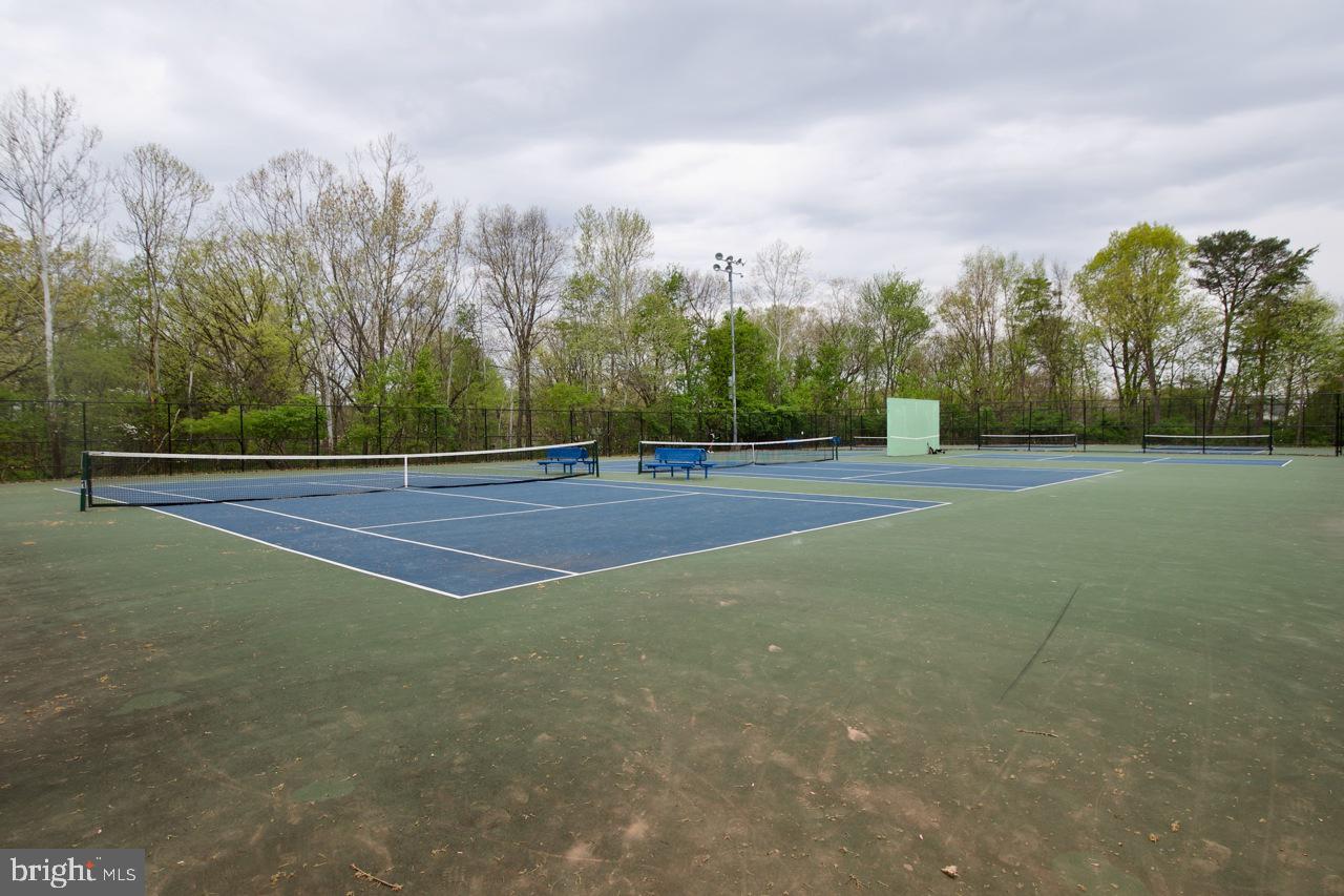 8450 Stonewall Road Manassas, VA 20110 - Photo 45 of 48 a view of an outdoor space and tennis court