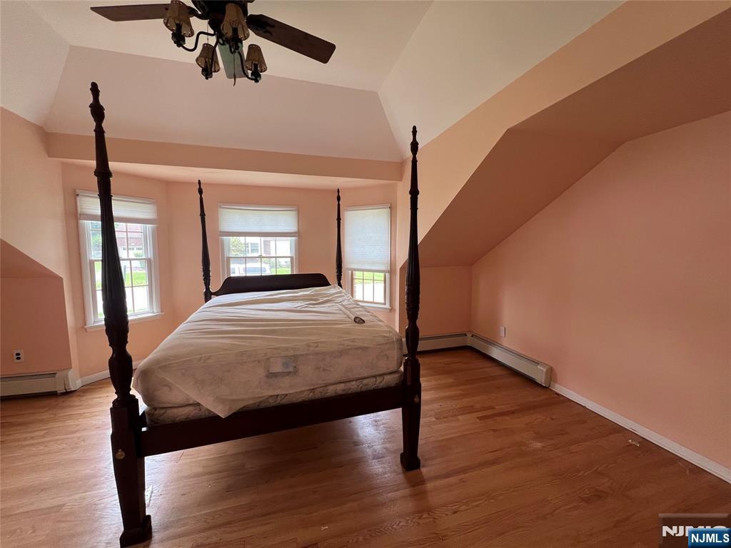 106 Prescott Street Demarest, NJ 07627 - Photo 19 of 24 a bedroom with a bed and a window