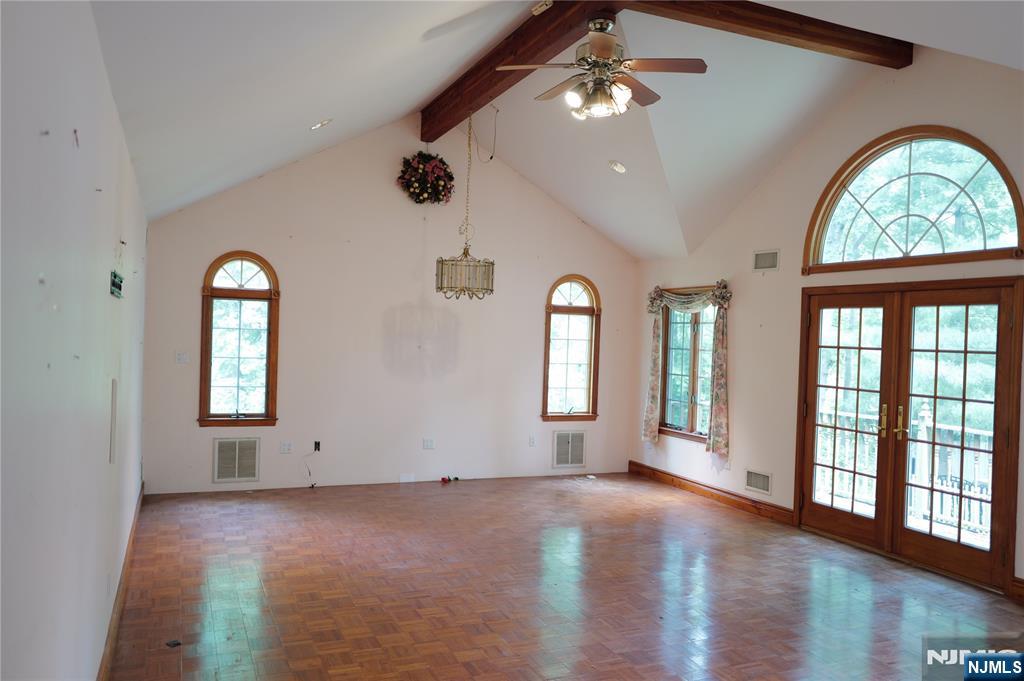 106 Prescott Street Demarest, NJ 07627 - Photo 5 of 24 a view of an empty room with a window