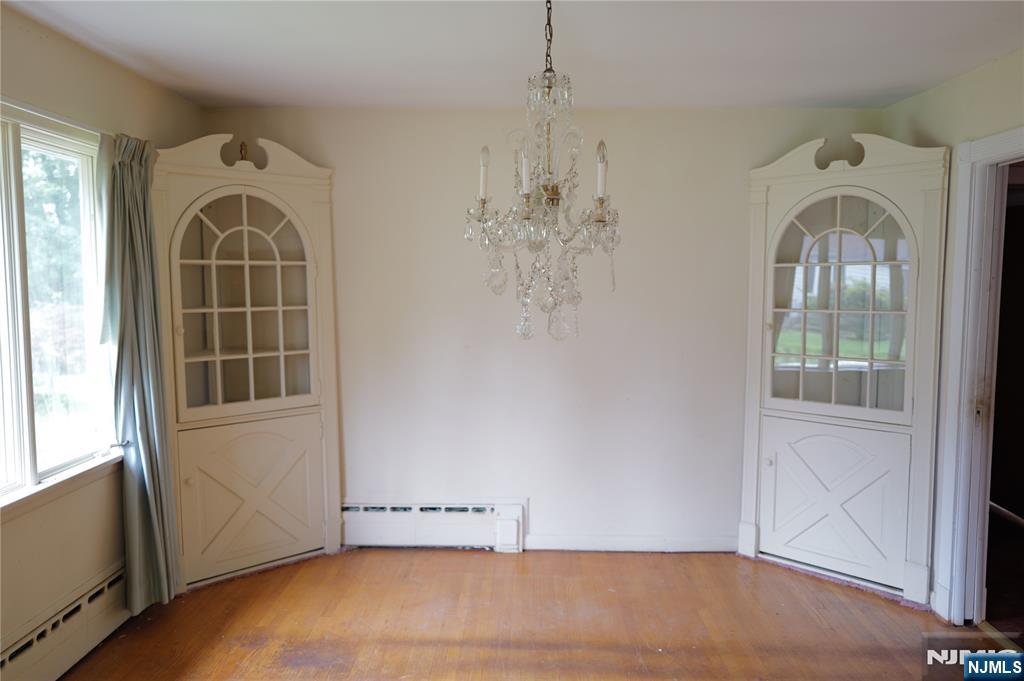 106 Prescott Street Demarest, NJ 07627 - Photo 7 of 24 an empty room with windows