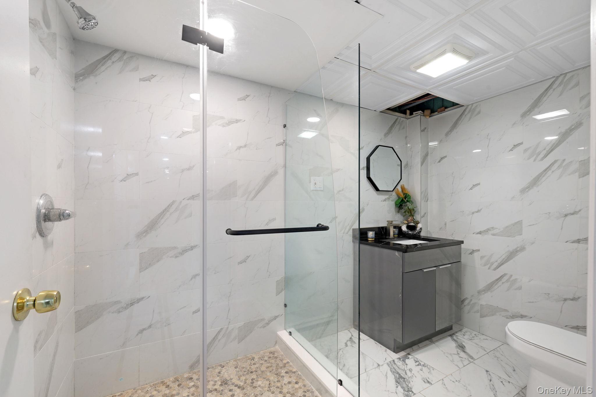 35 Kroeger Road Monticello, NY 12701 - Photo 24 of 29 a bathroom with a shower toilet and sink