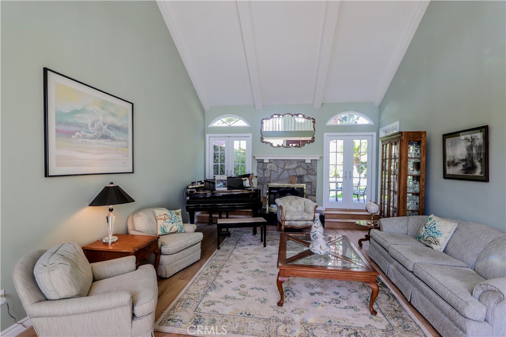 5 Cambridge Manhattan Beach, CA 90266 - Photo 20 of 71 a living room with furniture a rug and a large window