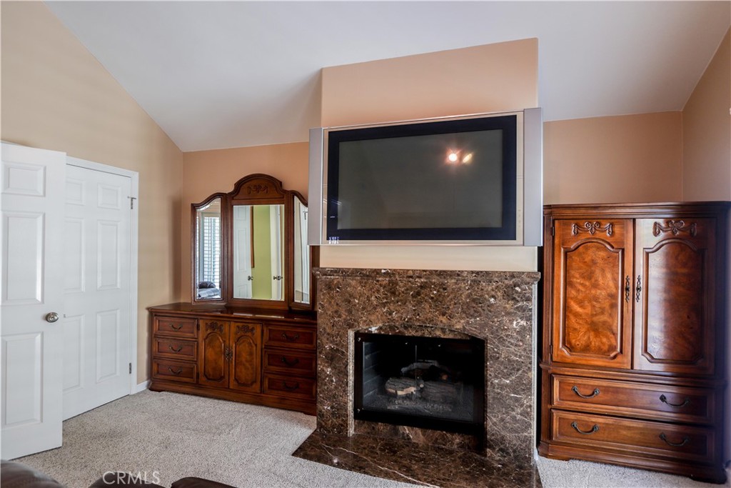 5 Cambridge Manhattan Beach, CA 90266 - Photo 48 of 71 a living room with furniture and a fireplace