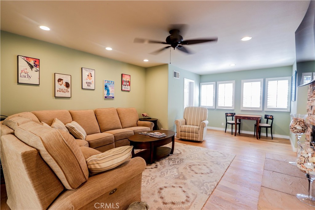5 Cambridge Manhattan Beach, CA 90266 - Photo 53 of 71 a living room with furniture and a large window