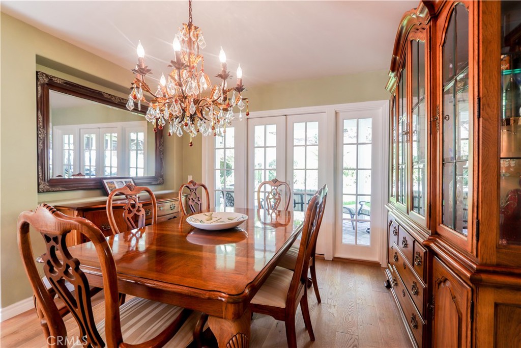 5 Cambridge Manhattan Beach, CA 90266 - Photo 63 of 71 a view of a dining room with furniture and a chandelier