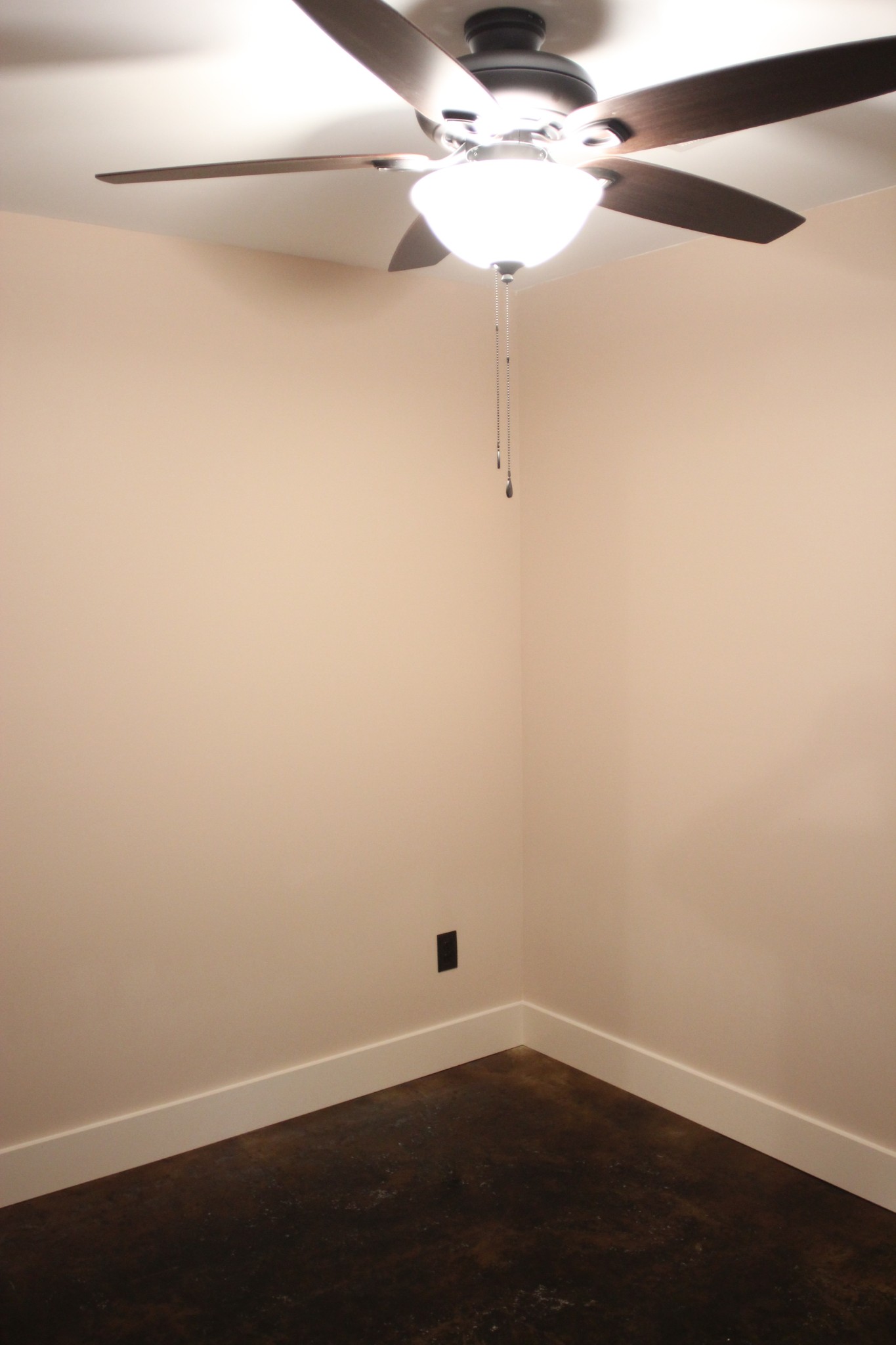 259 Jim Warren Road McMinnville, TN 37110 - Photo 10 of 13 a view of a small space with wooden floor and fan