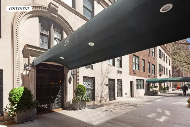 a bathroom with a sink toilet and a mirror