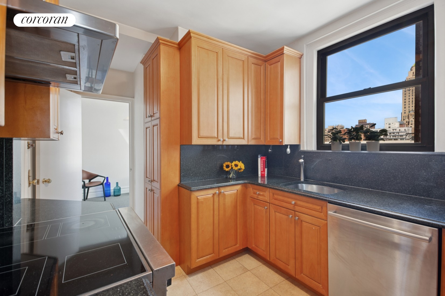 55 East 72nd Street, Unit 11N Manhattan, NY 10021 - Photo 5 of 14 a view of a kitchen with a sink and cabinets