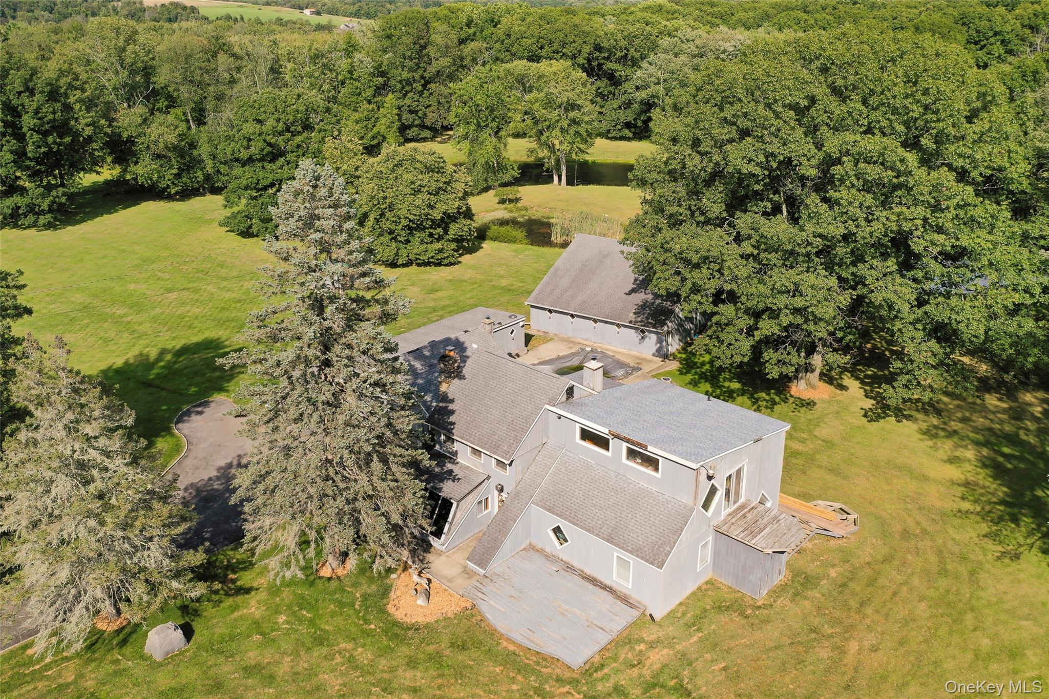 89 Deer Pond Road Verbank, NY 12585 - Photo 4 of 40 an aerial view of residential house with beach