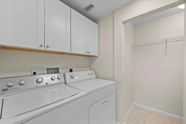 a view of a garden with potted plants