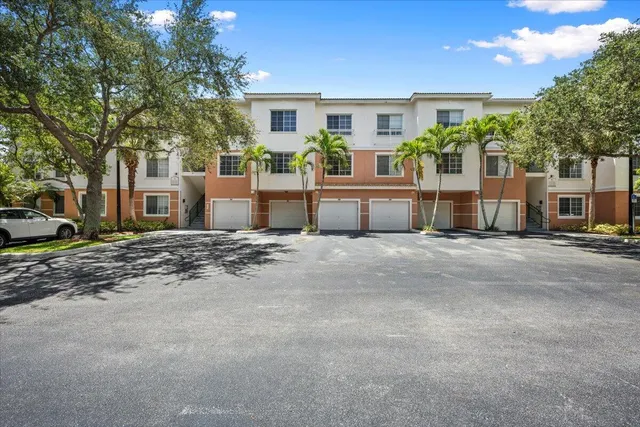 a kitchen with a refrigerator stove and microwave