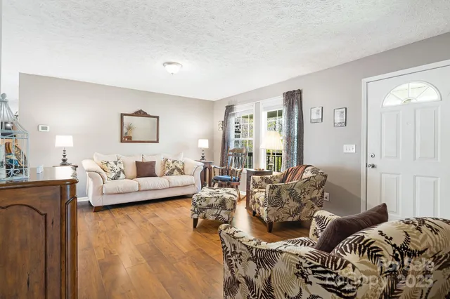 a living room with furniture and a couch