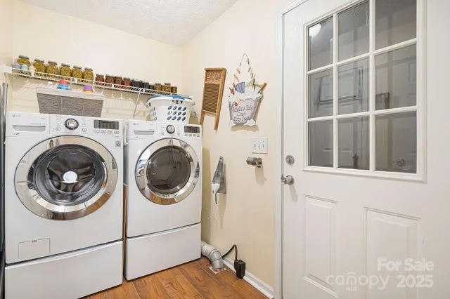 a utility room with dryer and washer