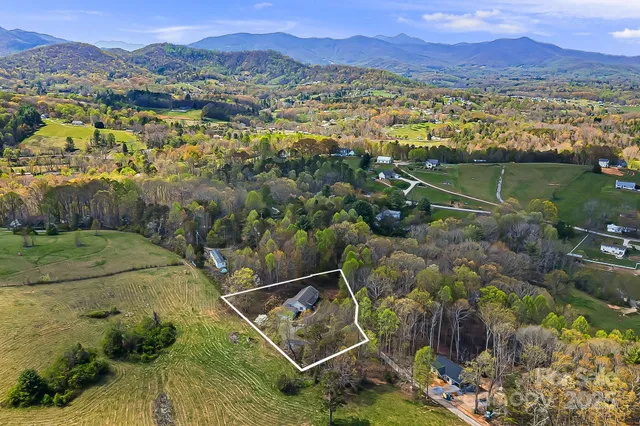 a view of a city with mountains in the background