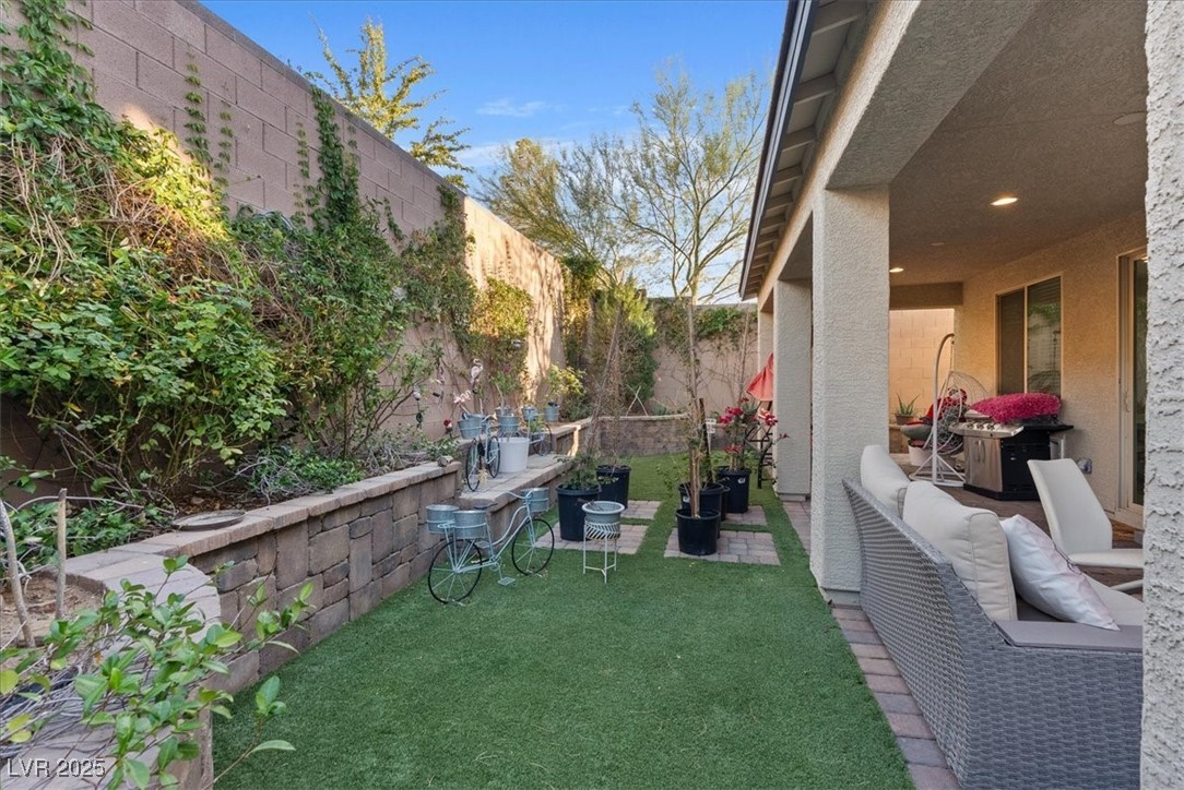 936 Keesey Way Henderson, NV 89052 - Photo 28 of 30 Fenced backyard with a patio
