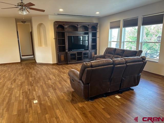 1941 Kaleigh Circle Cortez, CO 81321 - Photo 20 of 35 a living room with furniture and a window