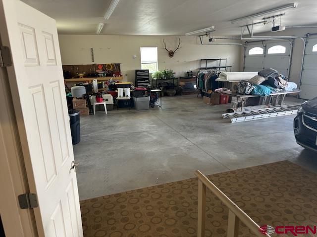 1941 Kaleigh Circle Cortez, CO 81321 - Photo 35 of 35 a living room with lots of furniture and a view of kitchen