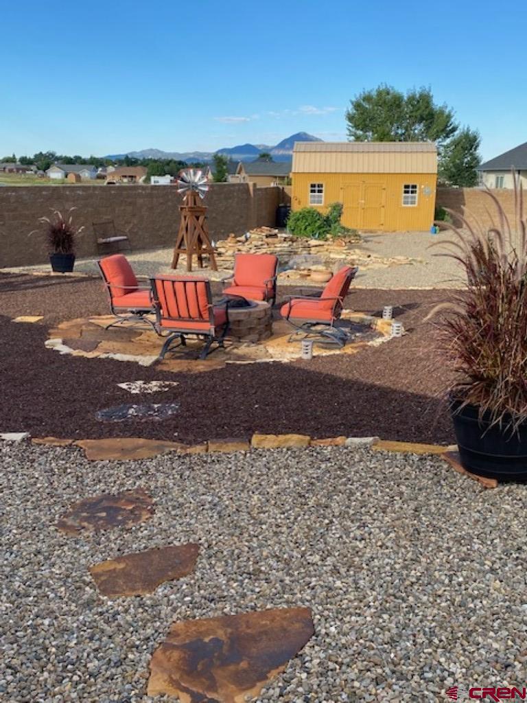 1941 Kaleigh Circle Cortez, CO 81321 - Photo 4 of 35 a terrace with outdoor seating and city view