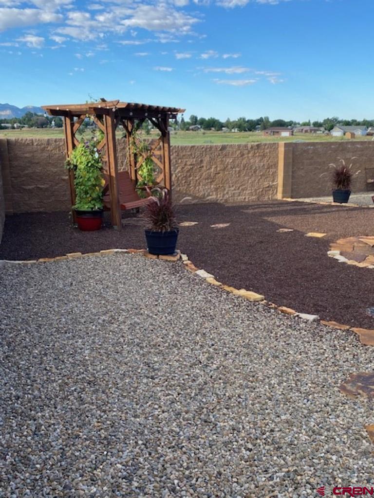 1941 Kaleigh Circle Cortez, CO 81321 - Photo 7 of 35 a view of a lake with a beach