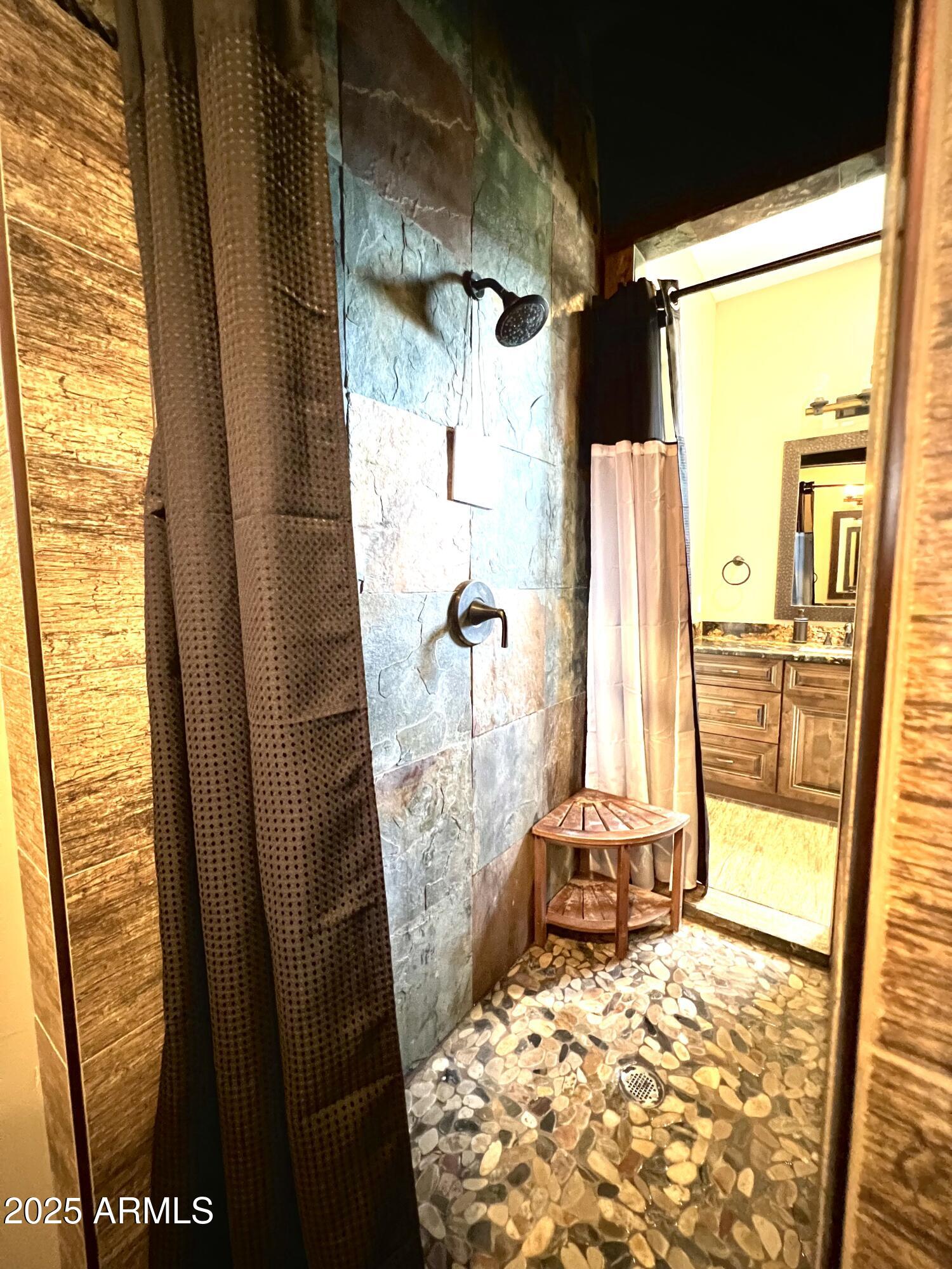 15035 East Countryside Road Mayer, AZ 86333 - Photo 14 of 37 a bathroom with a bathtub and next to a window