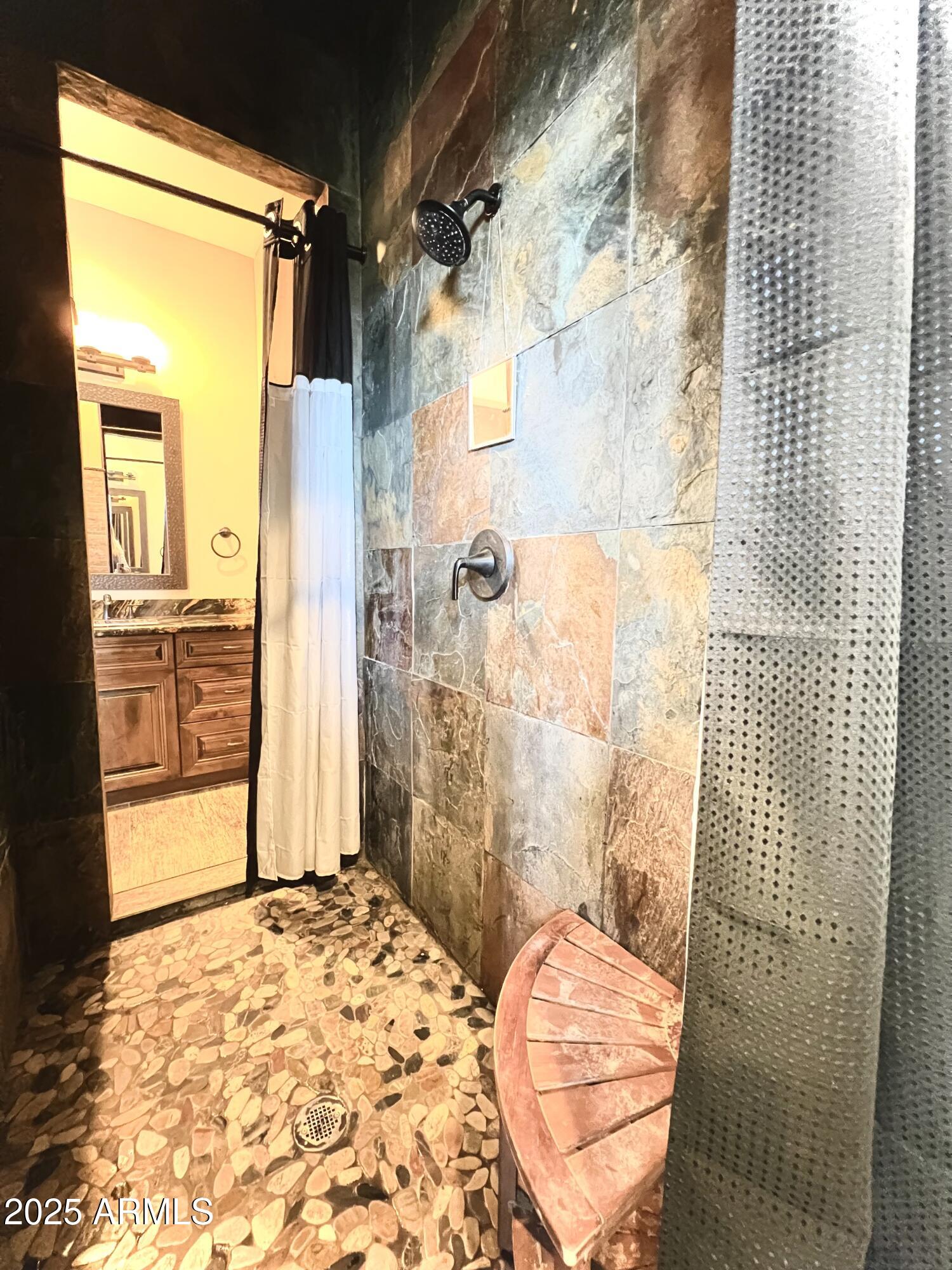 15035 East Countryside Road Mayer, AZ 86333 - Photo 15 of 37 a bathroom with a granite countertop shower and a sink