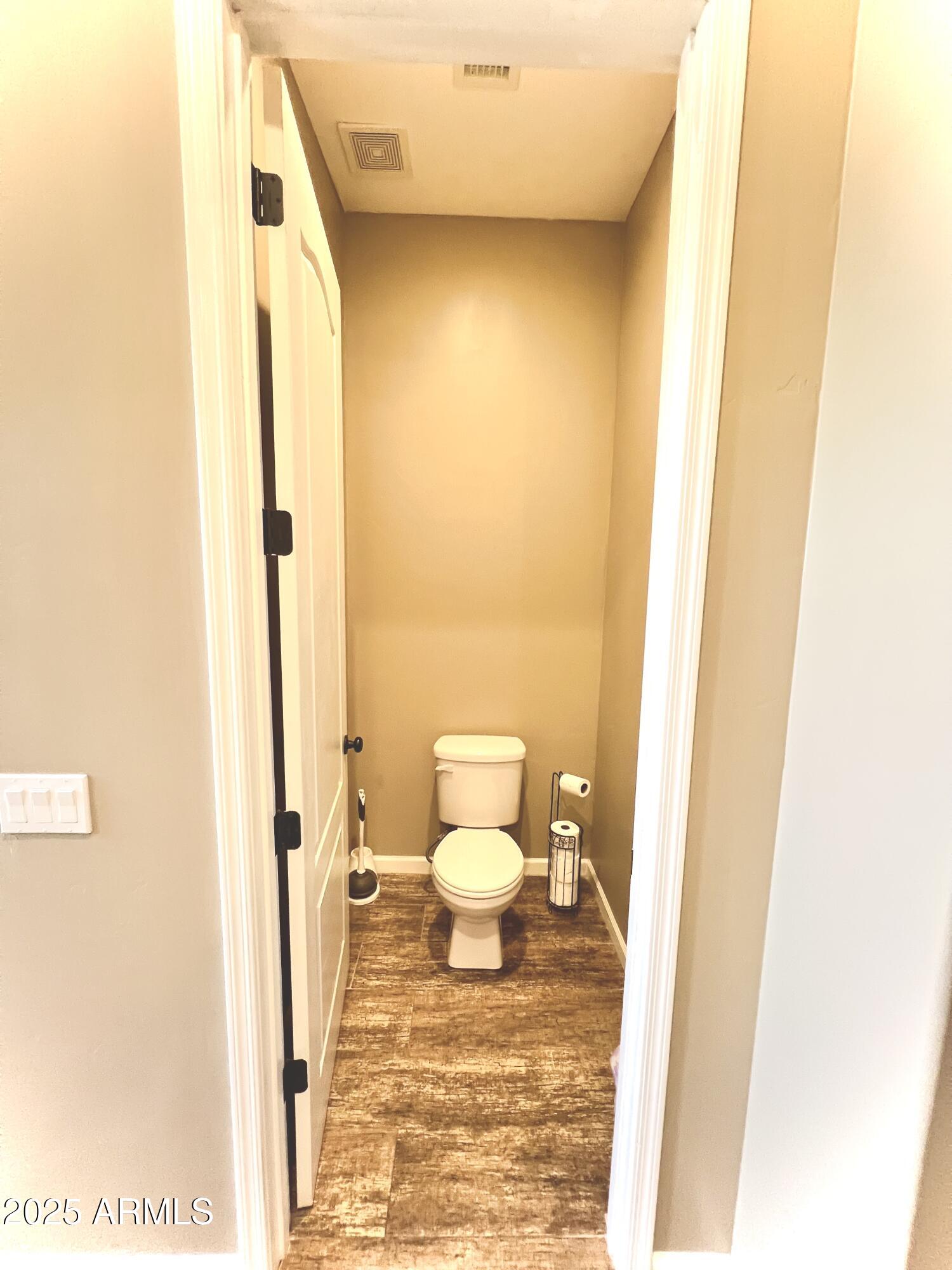 15035 East Countryside Road Mayer, AZ 86333 - Photo 17 of 37 a bathroom with a sink and a toilet
