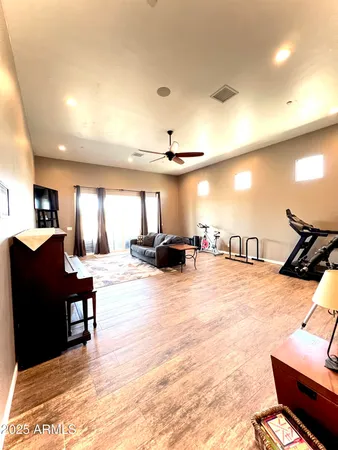 a view of a living room and kitchen