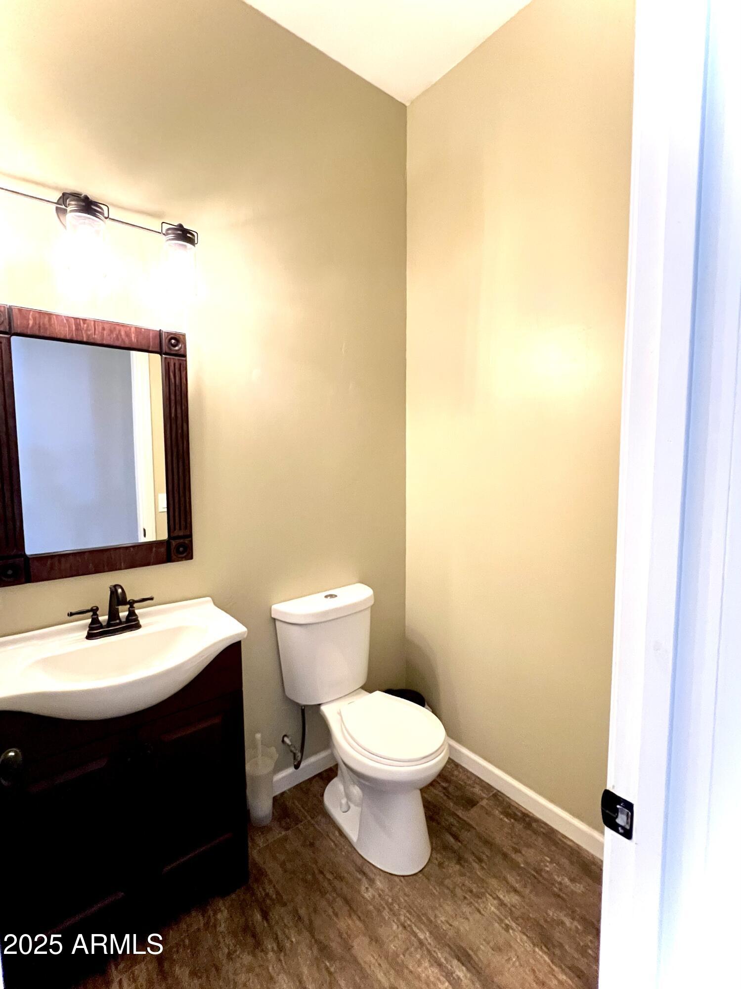 15035 East Countryside Road Mayer, AZ 86333 - Photo 22 of 37 a bathroom with a sink and a mirror