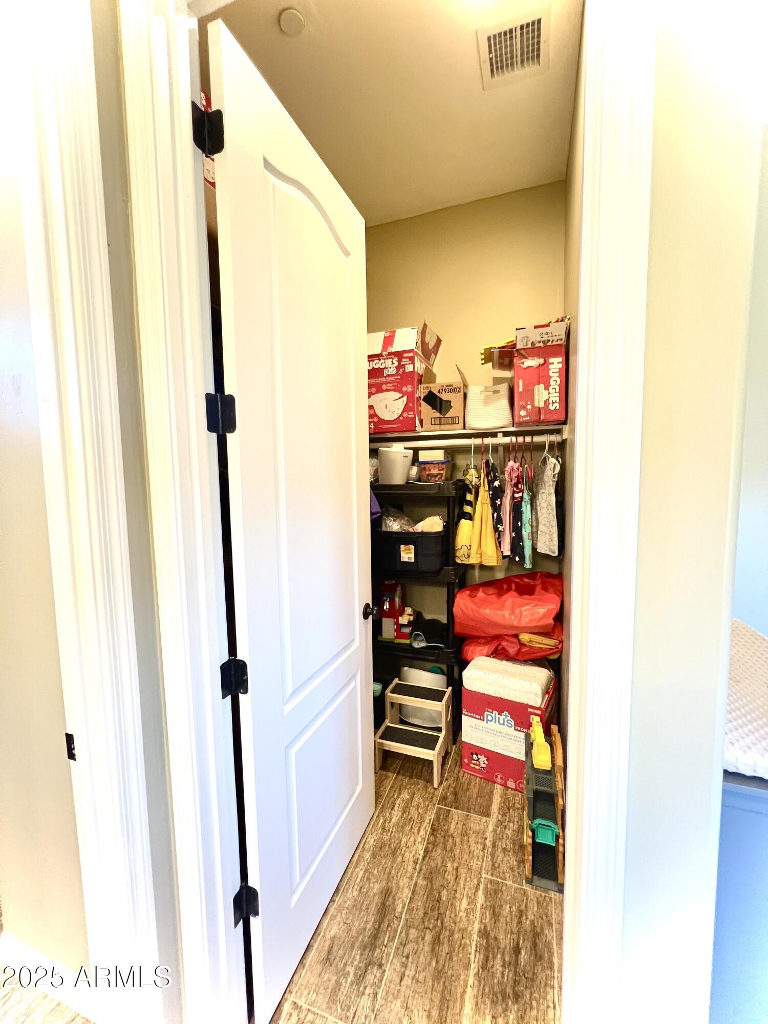 15035 East Countryside Road Mayer, AZ 86333 - Photo 26 of 37 a room with toys and storage