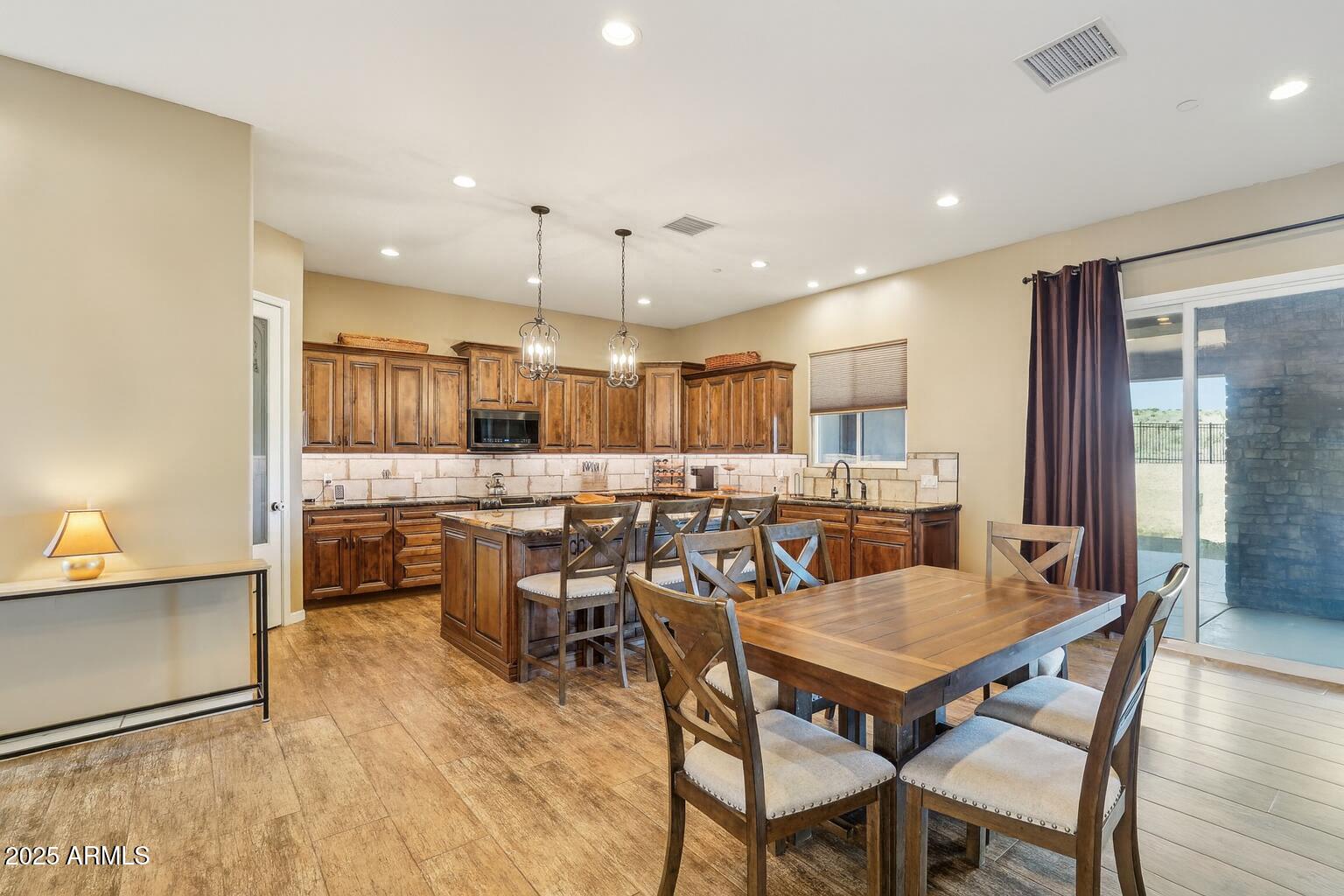 15035 East Countryside Road Mayer, AZ 86333 - Photo 4 of 37 a view of a dining room with furniture