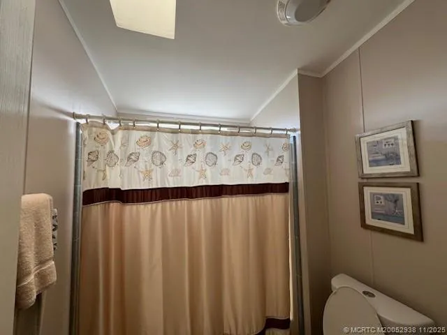 a view of a door and wooden floor