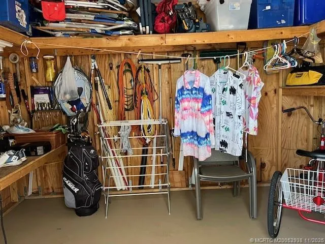 a view of a backyard with plants and a patio