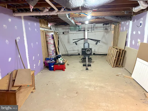 a balcony with wooden floor and furniture