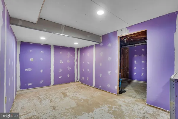 a view of a chairs and tables in the balcony