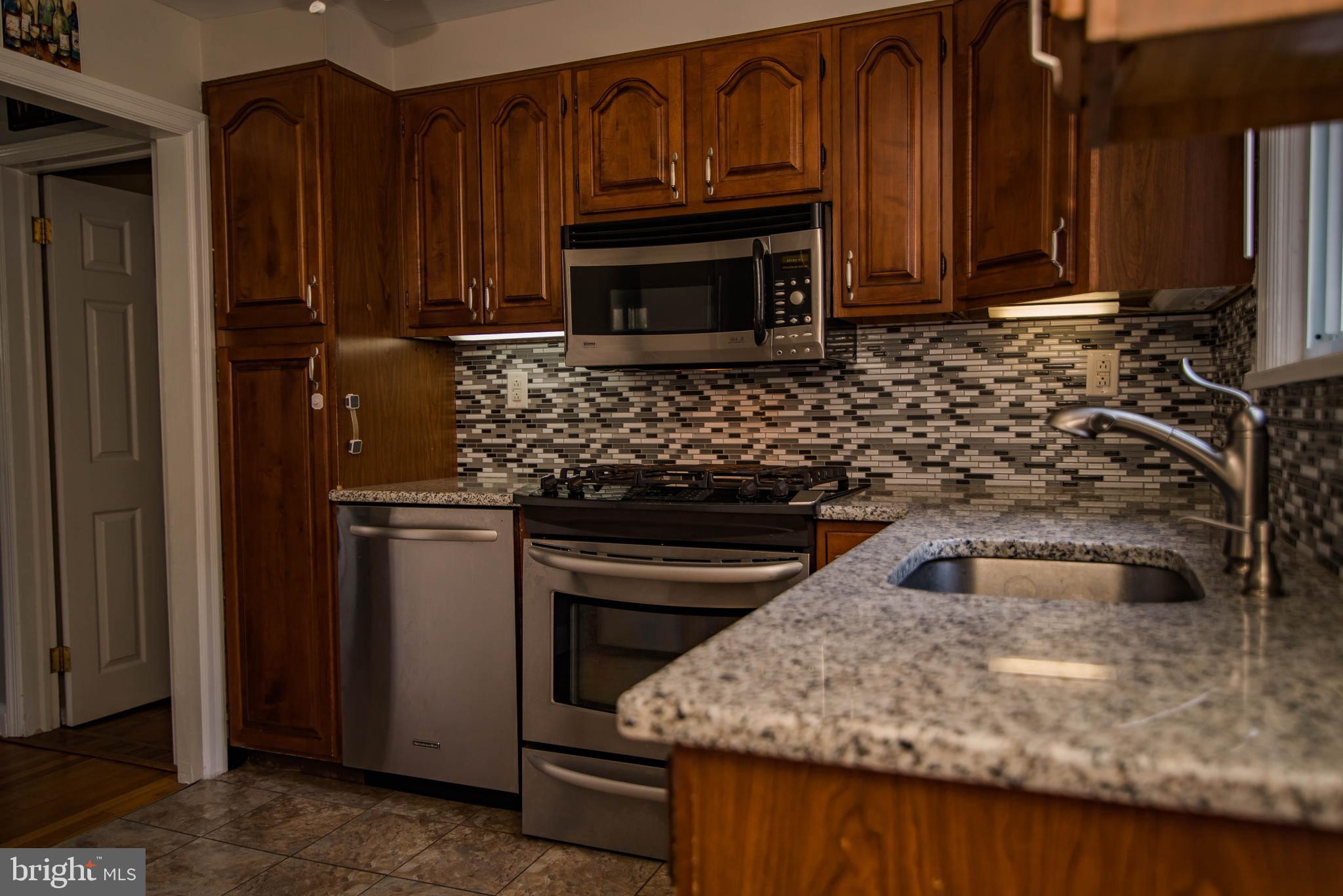 3018 Edmonds Road Lafayette Hill, PA 19444 - Photo 10 of 27 Granite counters and stainless appliances.
