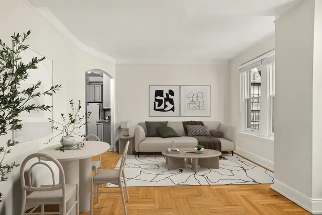 a living room with furniture and a rug