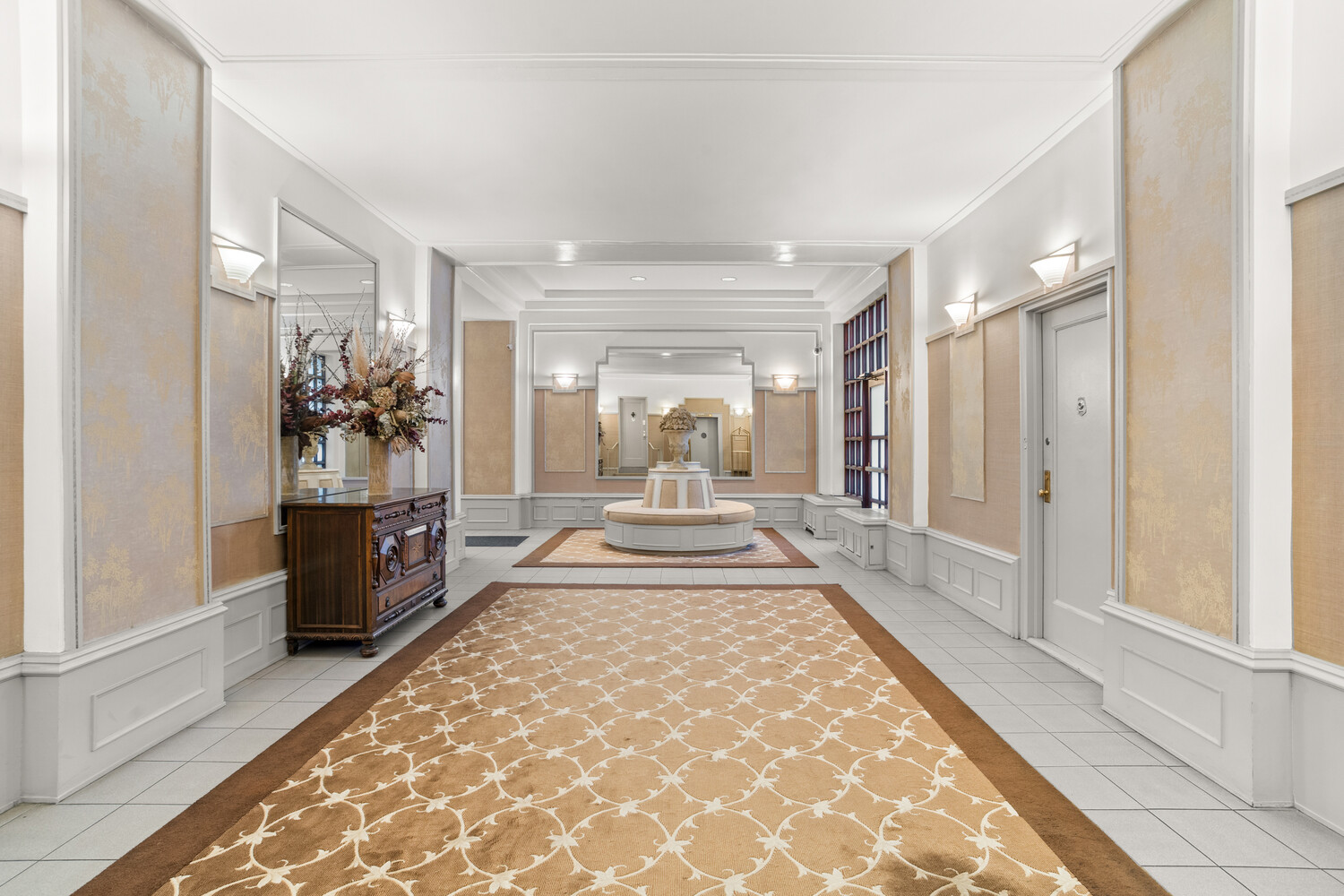 12 East 87th Street, Unit 6D Manhattan, NY 10028 - Photo 5 of 8 a large white room with wooden floor