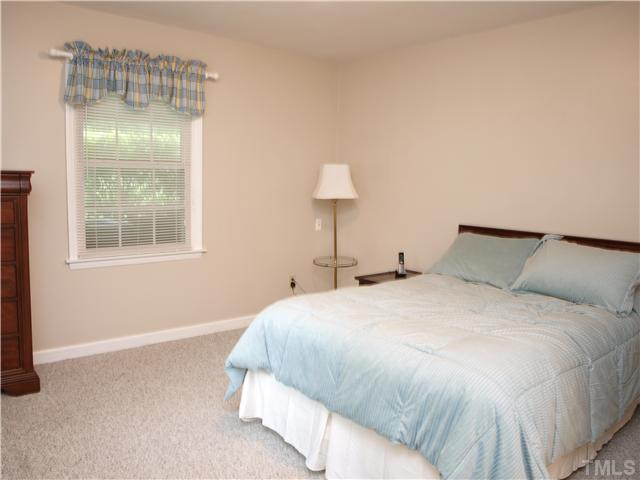 709 Catawba Street Raleigh, NC 27609 - Photo 14 of 21 lower level guest bedroom