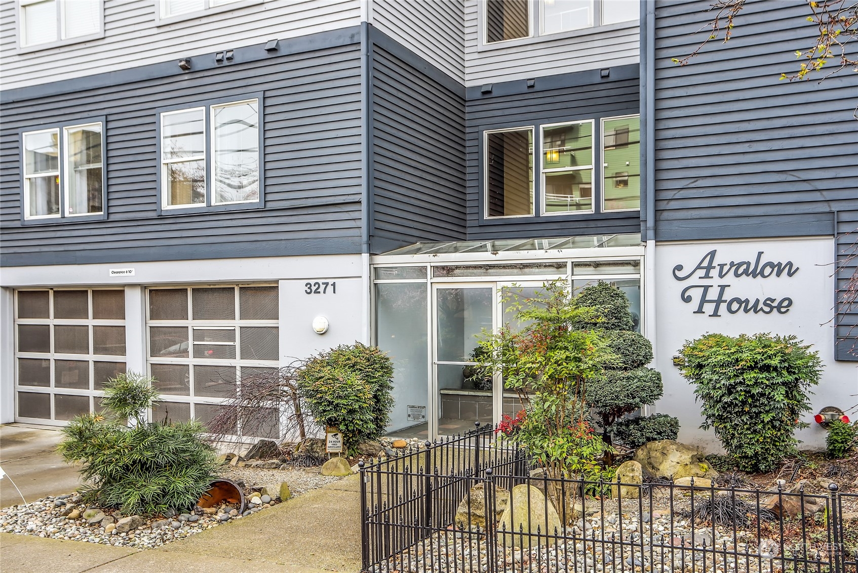 a view of a house with potted plants and a potted plant