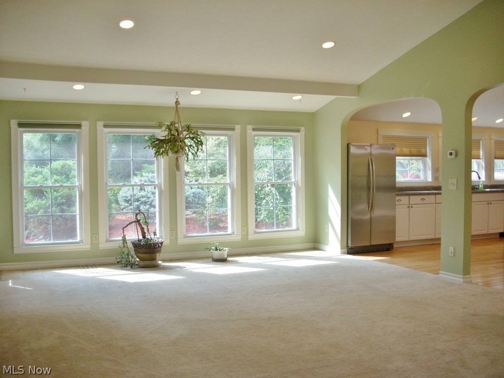 6931 North Ridge Road East Geneva, OH 44041 - Photo 3 of 25 Great Room facing the south, open to the kitchen and dining room.