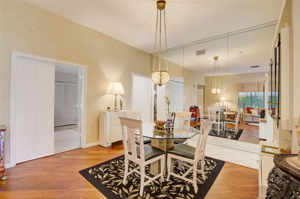 5051 Pine Drive Boynton Beach, FL 33437 - Photo 12 of 40 a living room with furniture and wooden floor