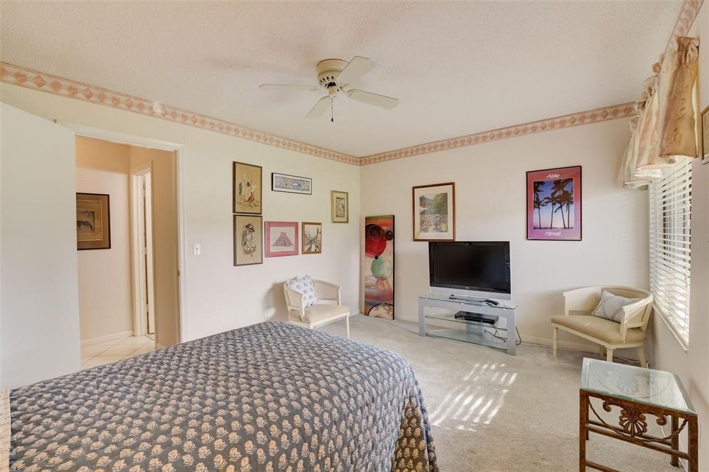 5051 Pine Drive Boynton Beach, FL 33437 - Photo 27 of 40 a bedroom with a workspace