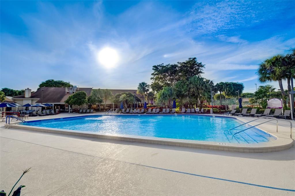 5051 Pine Drive Boynton Beach, FL 33437 - Photo 37 of 40 a view of a swimming pool and outdoor space