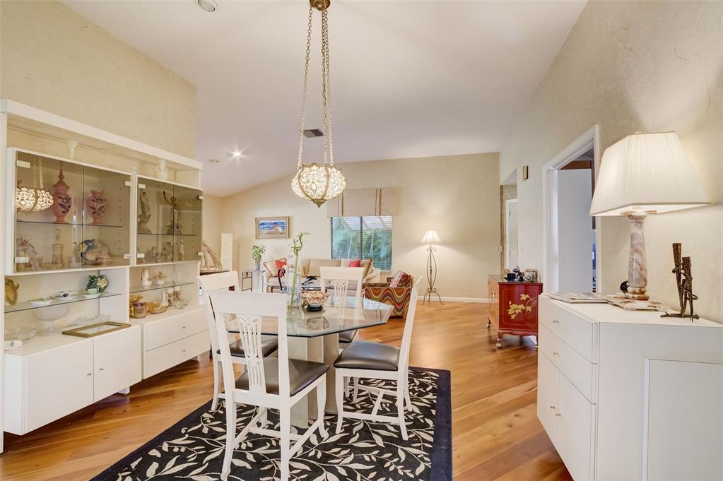 5051 Pine Drive Boynton Beach, FL 33437 - Photo 10 of 40 a very nice looking dining room with a table and chairs