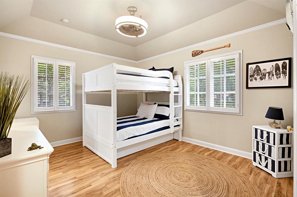 103 Glenn Road Mabank, TX 75156 - Photo 27 of 38 a view of front door and bedroom with wooden floor