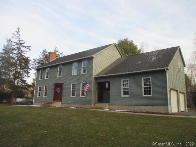 136 Florida Road Somers, CT 06071 - Photo 1 of 1 a front view of a house with a garden